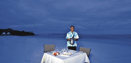 Romantisches Abendessen am Strand, ©RobbiNewman.com